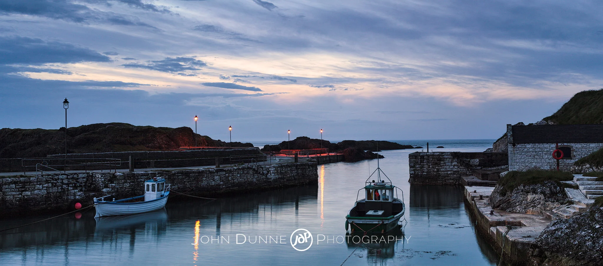 Dusk at Ballintoy Harbour by © John Dunne 2014, all rights reserved.