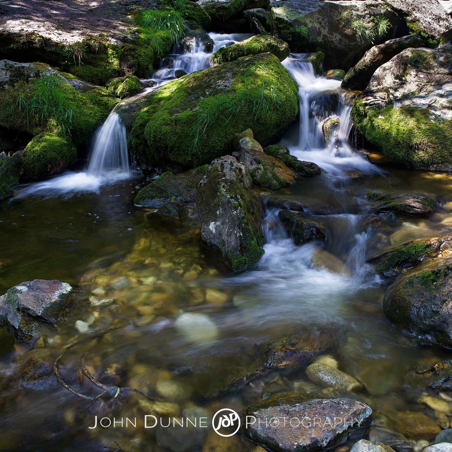 Sunlight, Shadows and Waterfalls by John Dunne. 